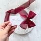 Poppy Place Card With Dark Red Bow